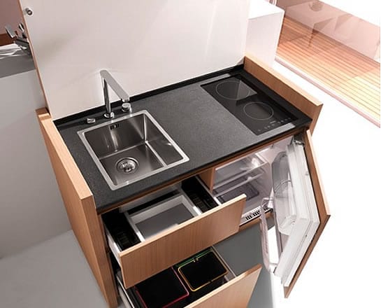 modern small kitchen unit with sink and refrigerator to save space in the kitchen