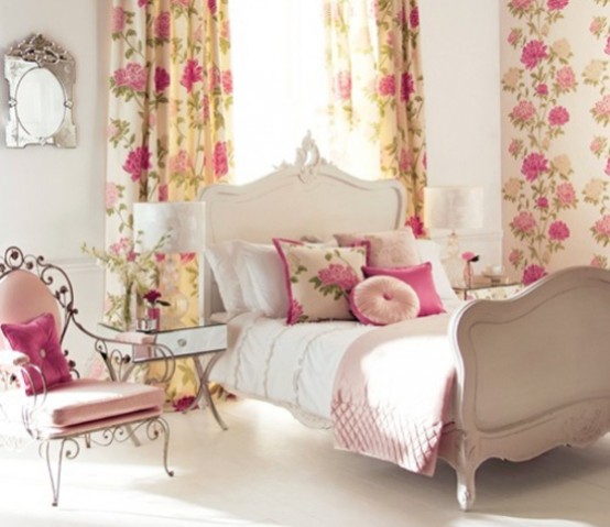 a bright vintage bedroom with refined neutral furniture, floral and bright pink textiles, a chic mirror and a mirrored nightstand is amazing