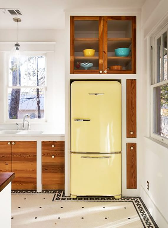 toole kitchen equipment with retro refrigerator in light yellow and built-in kitchen cabinets with wooden cabinet doors as an idea for modern kitchen design in white and wood